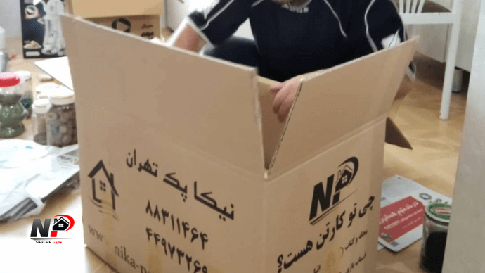 بسته بندی توسط کارگر باربری غرب تهران